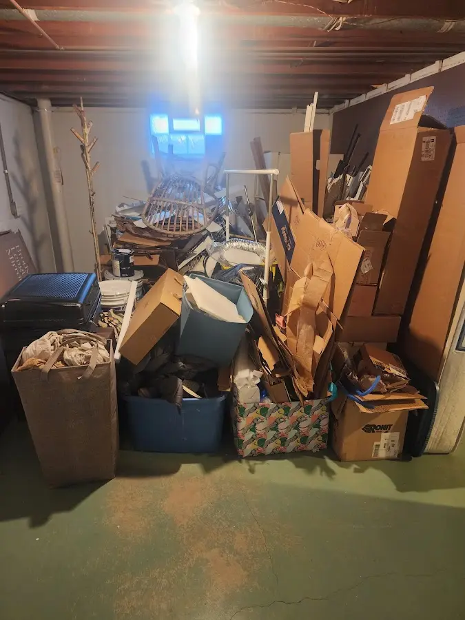 Roll-off dumpster container at job site for 4 Yard Dumpster Rental in Fountainhead-Orchard Hills